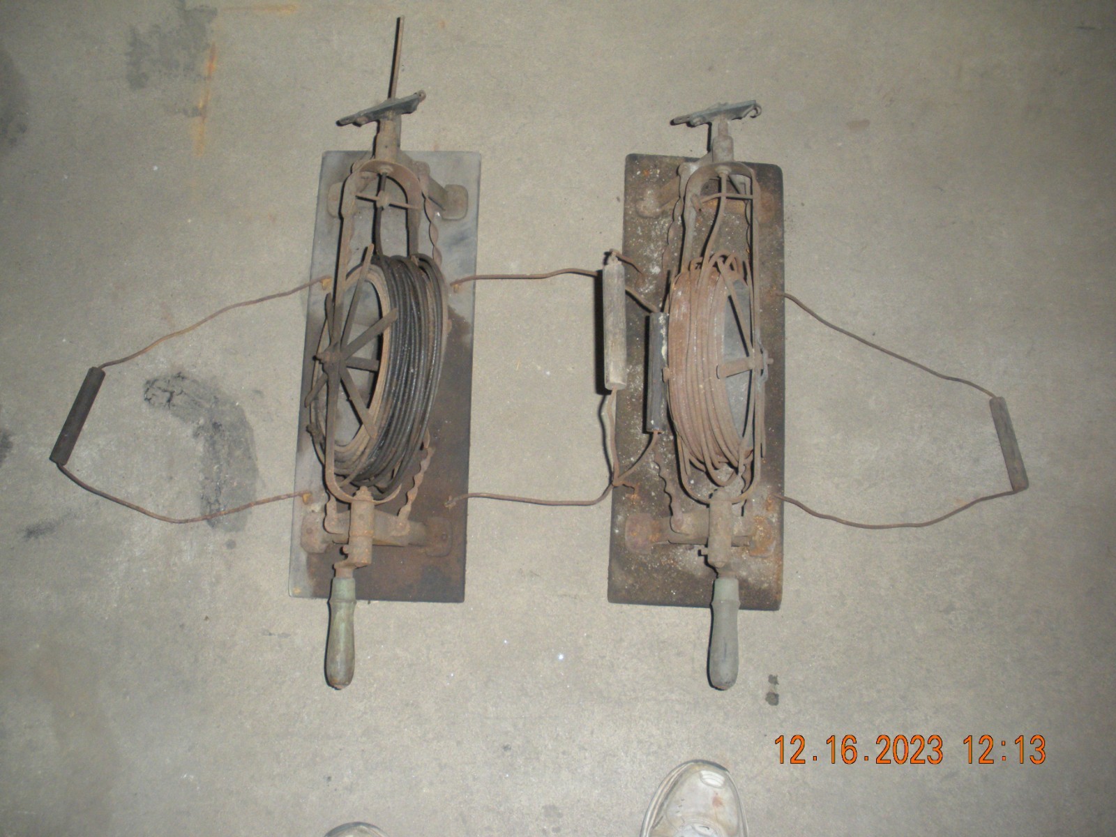 Two *MADE IN USA* antique hand cranked drain snakes, used