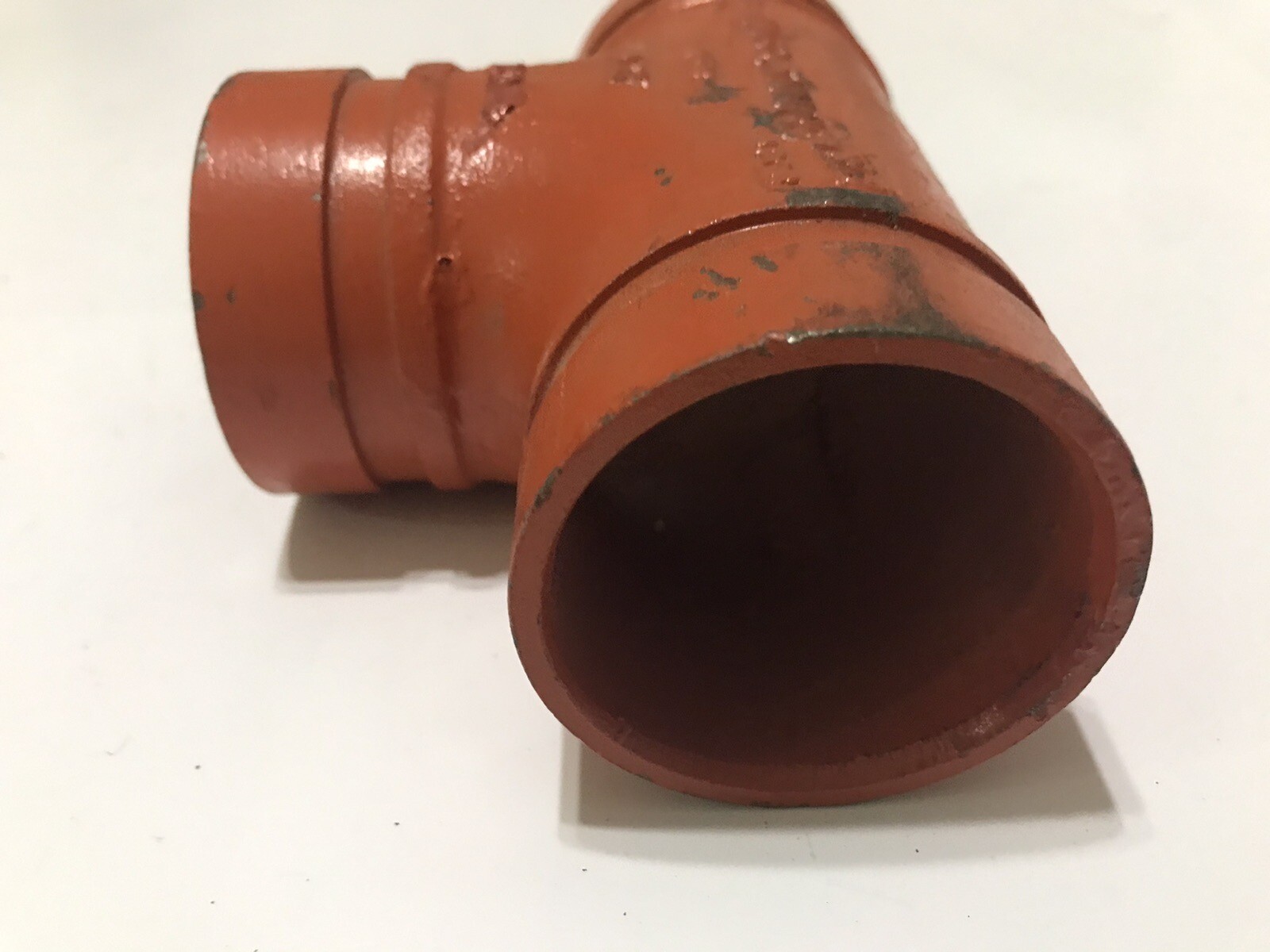 SPF ST1 2″ Tee Grooved Short Radius Ductile Iron Orange ST1-0200