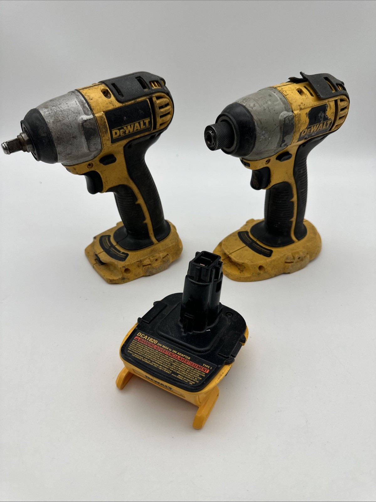 Lot Of 2 DeWalt 1/4, 3/8 Drive 18V Impact No battery Or Charger W/ 20v Adapter
