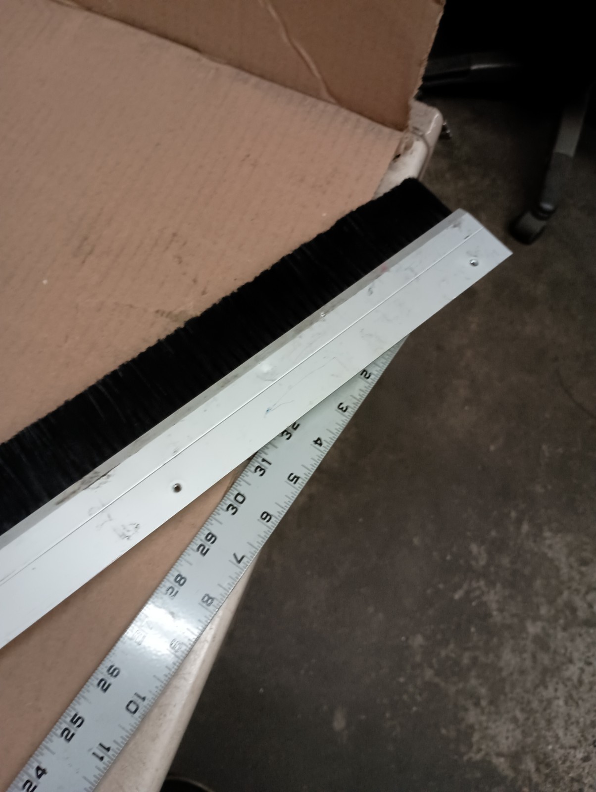 45 in Door Sweep, Aluminum, Nylon Brush Very Good Pre Owned