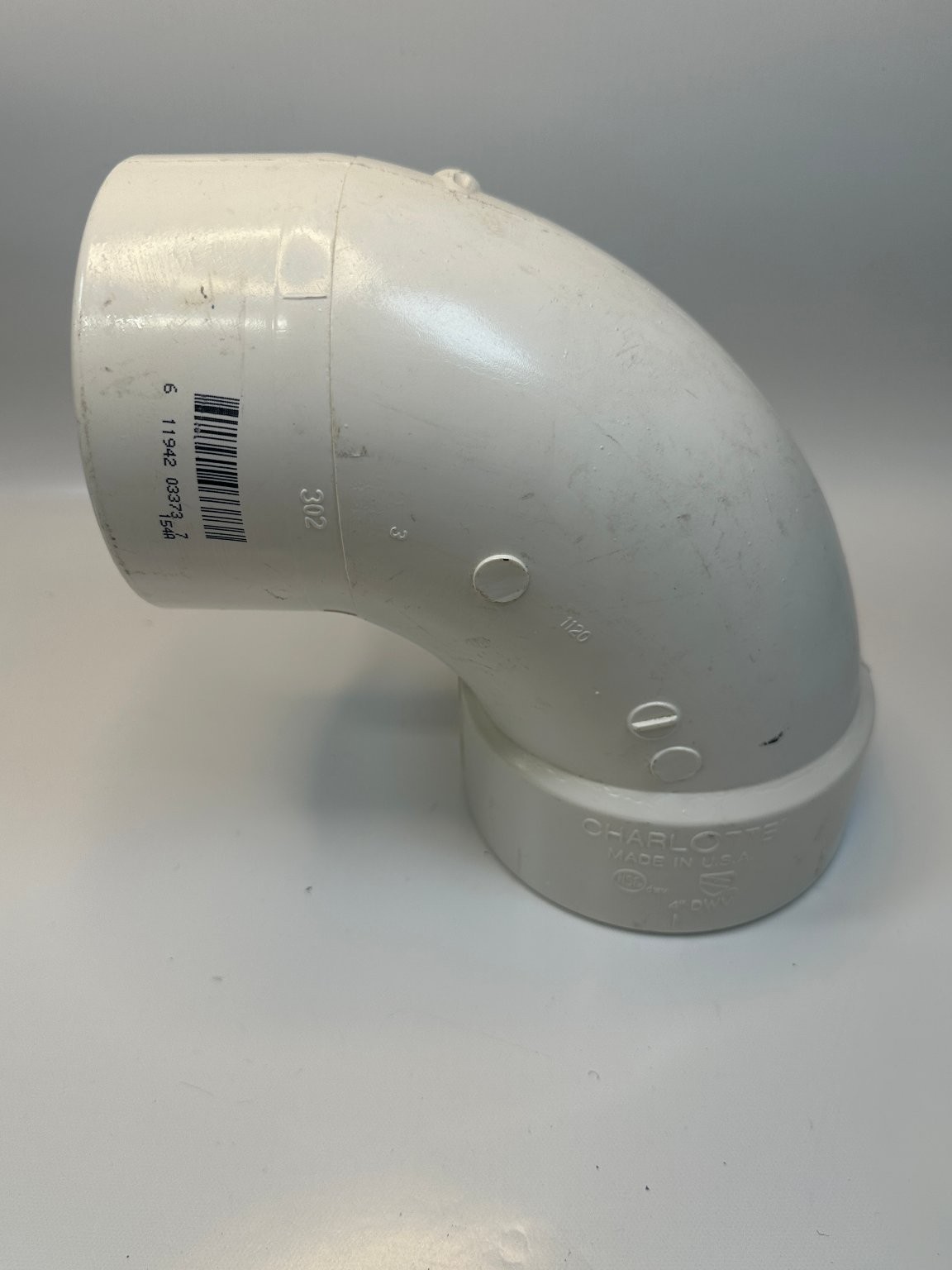 Charlotte #302 4″ DWV 90-Degree Male x Female PVC Pipe Elbow USA