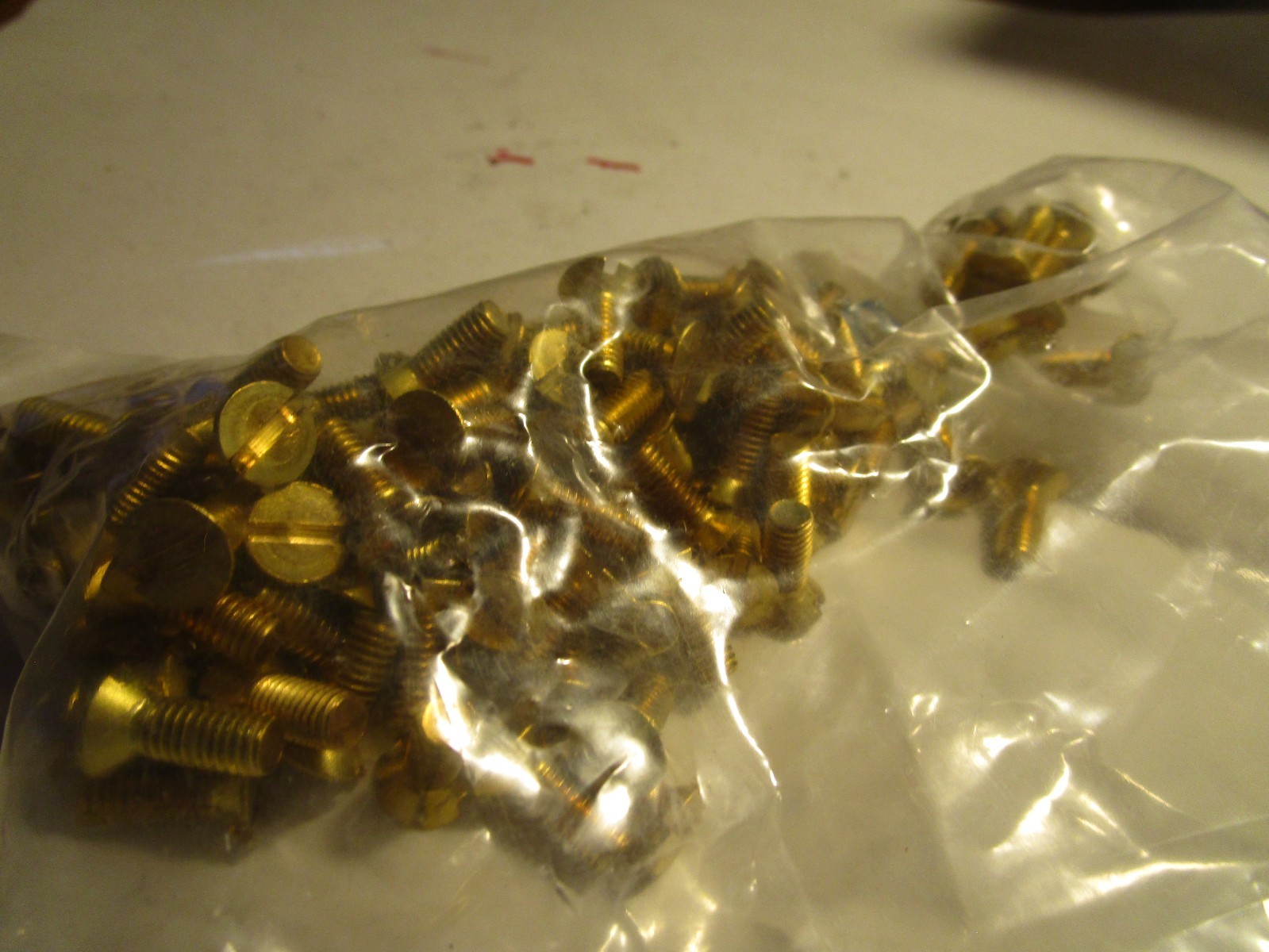 #10-32 x 1/2″ Slotted Drive Flat Head Brass Machine Screw QTY 100